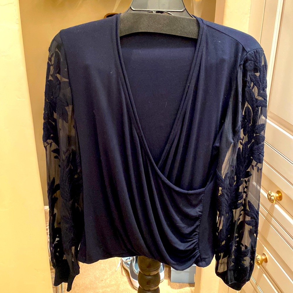 Elie Tahari knit top with sheer embroidered sleeves. Rich navy, size L.